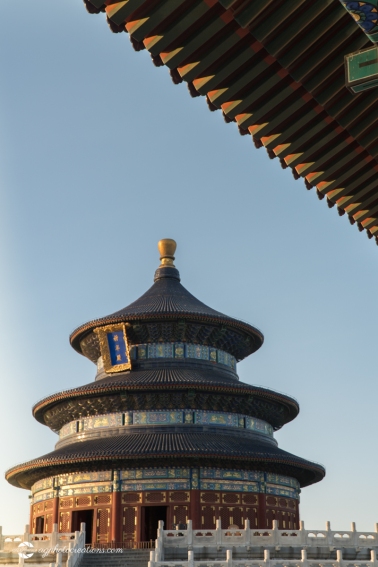 Side shot of the Temple of Heaven on a Sunny Afternoon in Beijing China with inscription "Hall of Prayer for Good Harvest" - Vertical